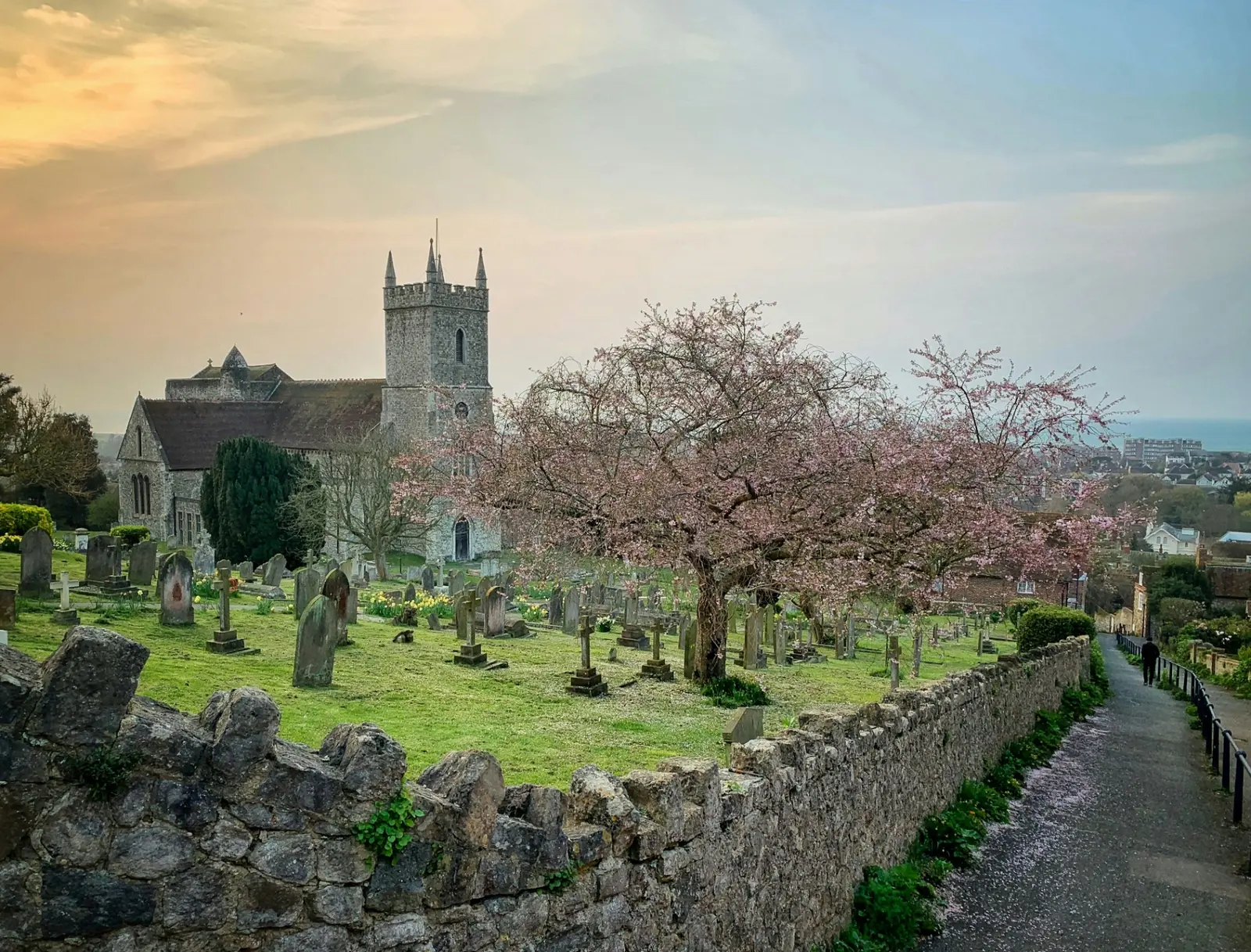 Historic church and graveyard at sunset