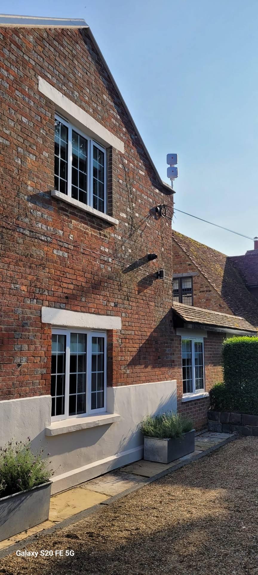 Engineer-installed wireless antennas on a UK building