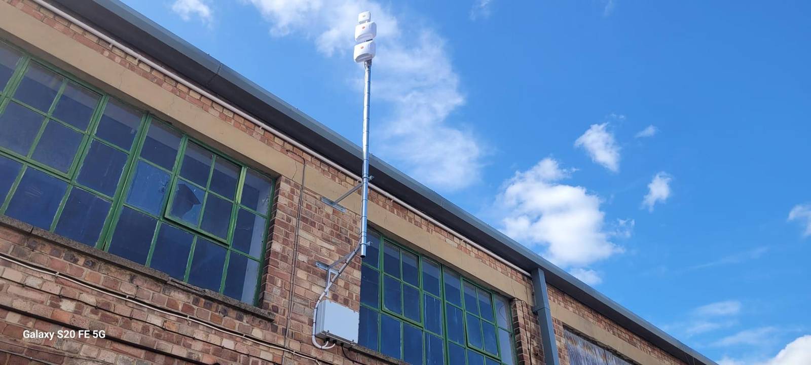 Engineer installing enterprise connectivity on site